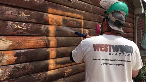 Sandblasting wood .